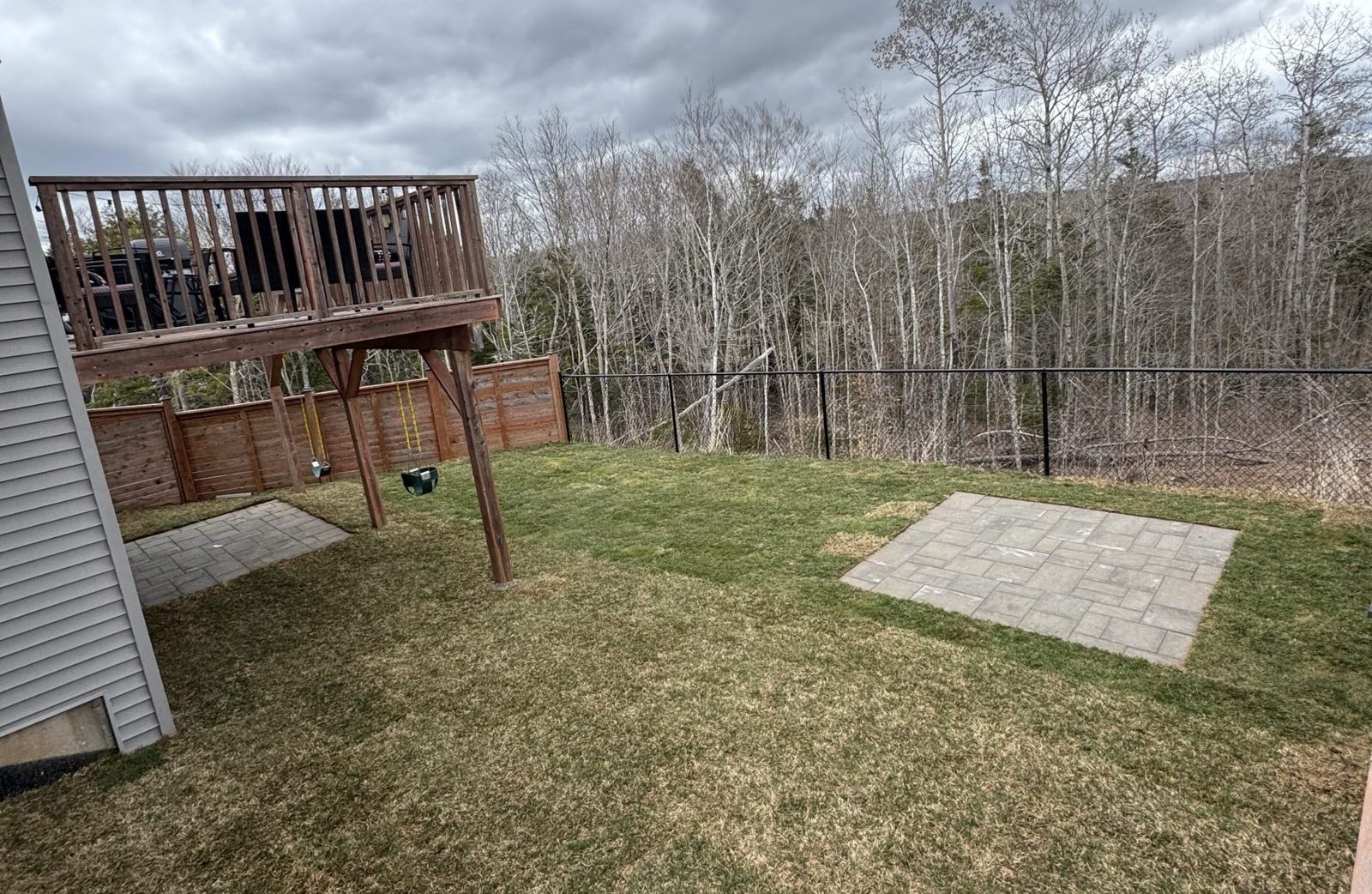 Backyard patio with garden beds