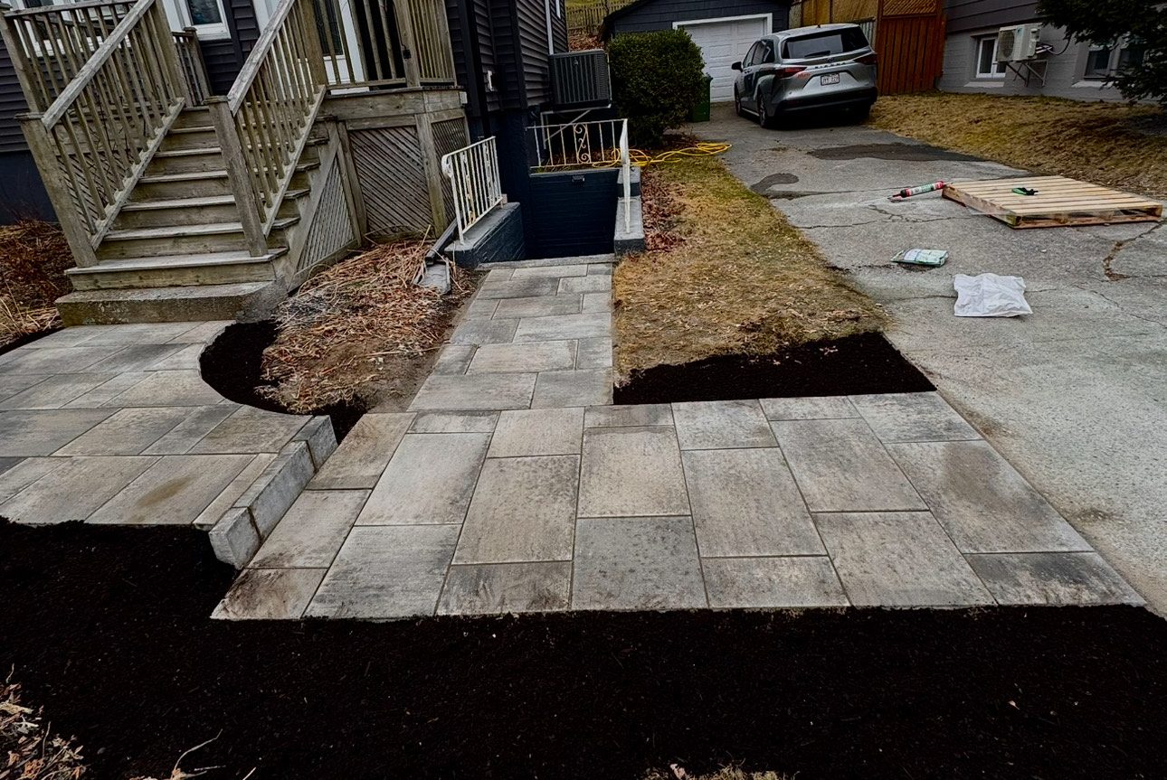 Landscaped front yard with gravel beds